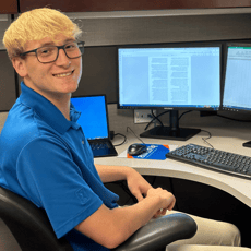 2024 Summer Intern John McCarty Working at Desk