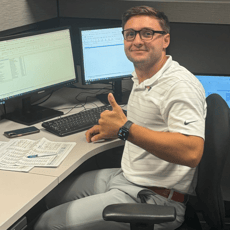 2024 Summer Intern Nick Floyd Working at Desk